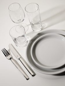 Modern white porcelain with silver cutlery and crystal from Glancy Fawcett