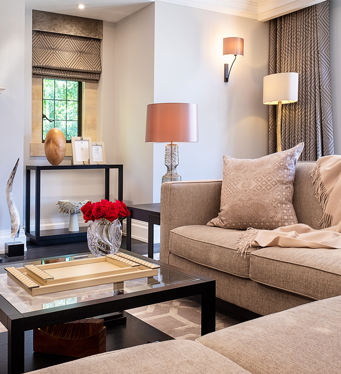 a neutral sitting room interior with luxury accessories 