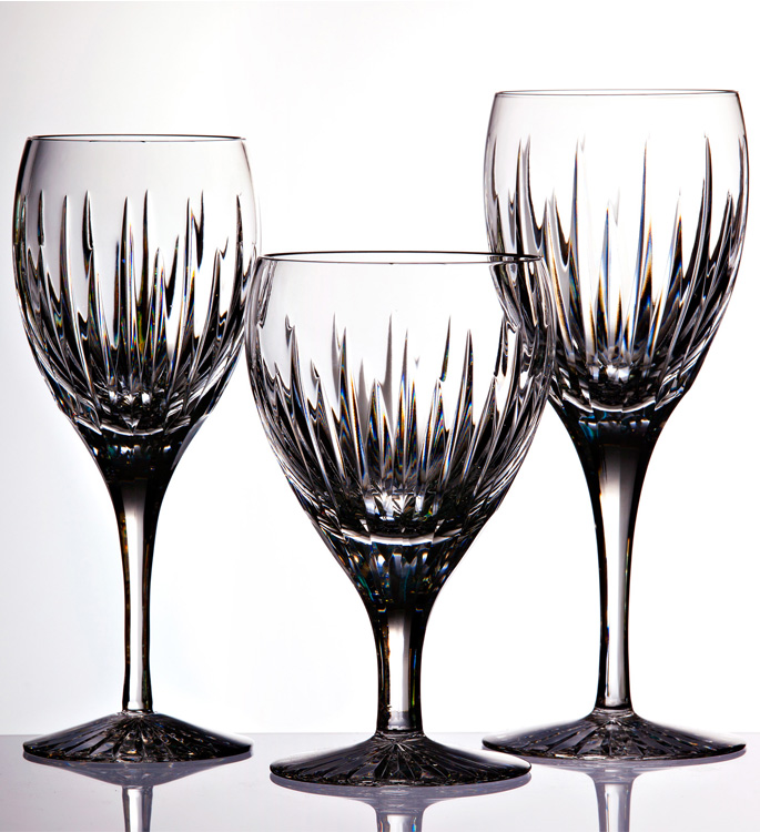 a white wine, red wine and water crystal class with hand cut lines in the glass