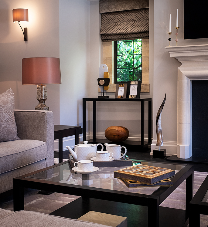 a luxury tea setting and a board game in a home's sitting room