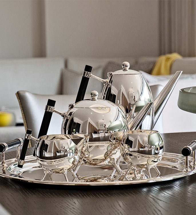 a sterling silver Christopher Dresser inspired tea set 