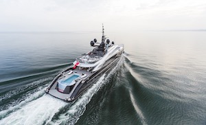 A superyacht powers through the waves Glancy Fawcett