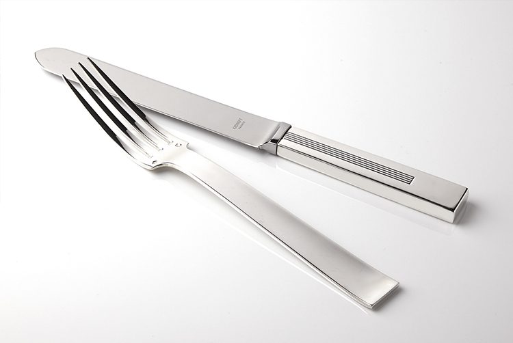 silver modern cutlery in detail with square handles