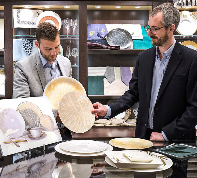 Design team working on a tableware design brief in the Glancy Fawcett Table Linen Showroom