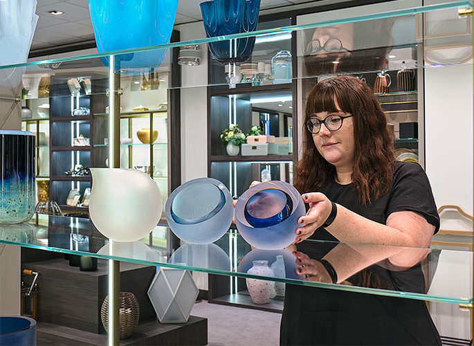 Samples team selecting luxury product to send to a client from the Accessories Showroom