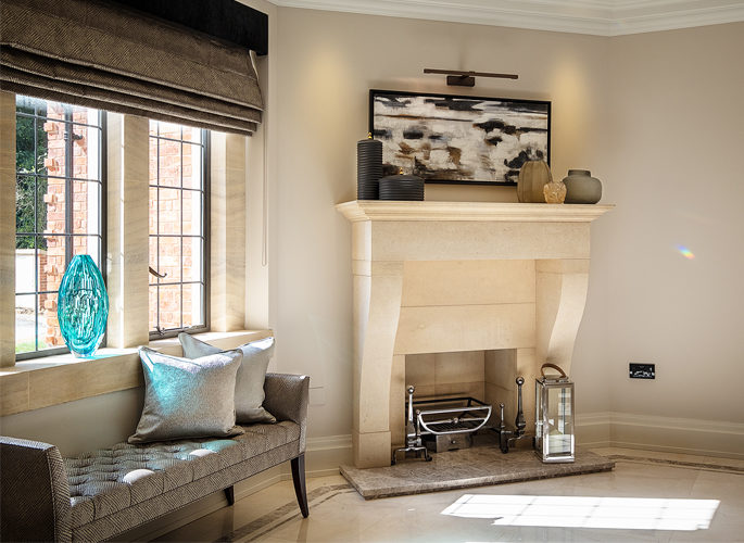 fireplace with decorative accessories and hurricane lamps