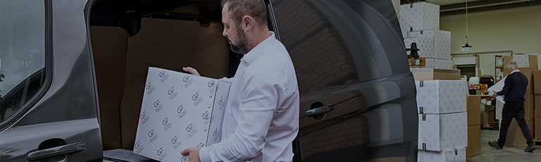 The Logistics team loading the van with luxury goods ready for delivering