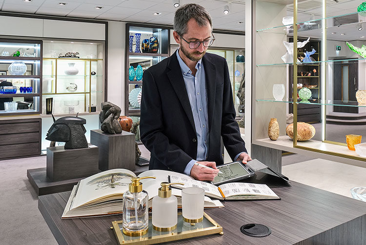 Design Team working on a bathroom accessory design in the Glancy Fawcett Showroom with a client