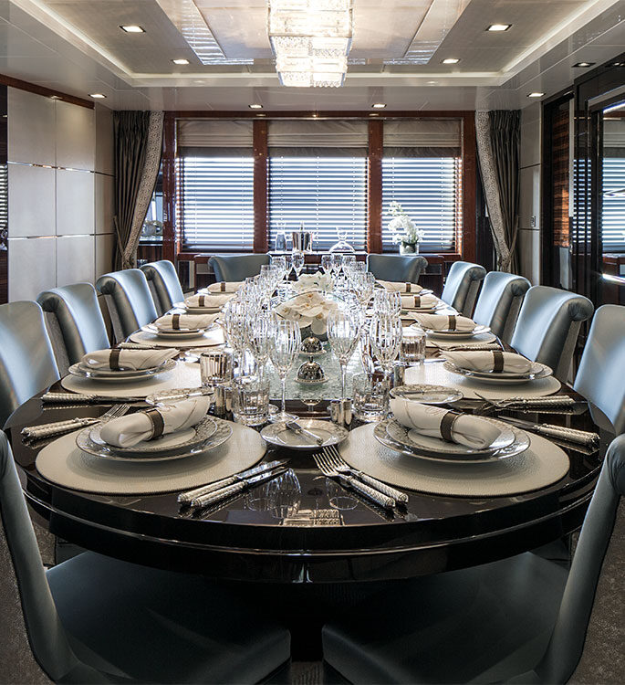 A luxury dining setting on a superyacht
